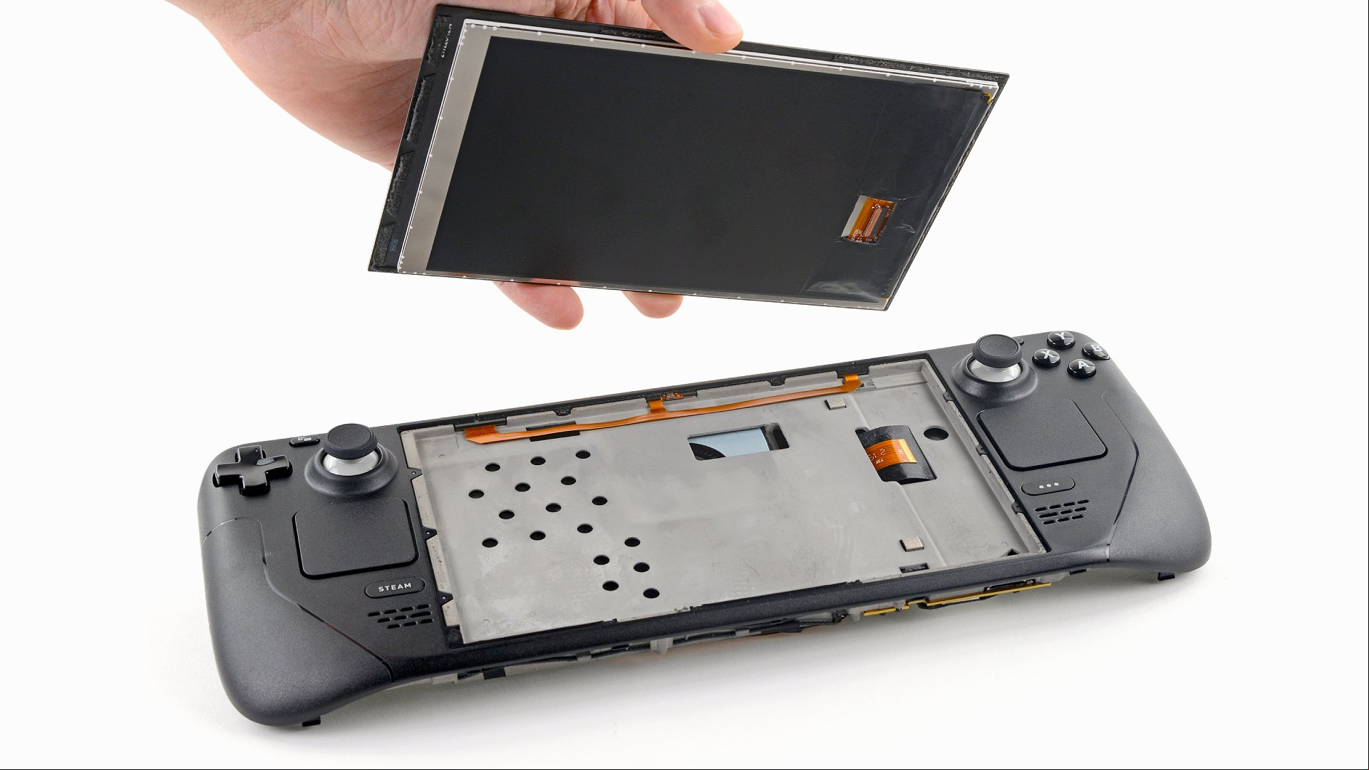 Ifixit tutorial image of hand removing Steam Deck screen