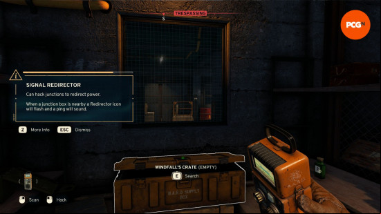 Atomfall signal redirector: an open crate, orange colored.